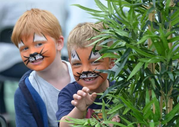 Youngsters enjoyed face paiting before a screening of The Lion King.