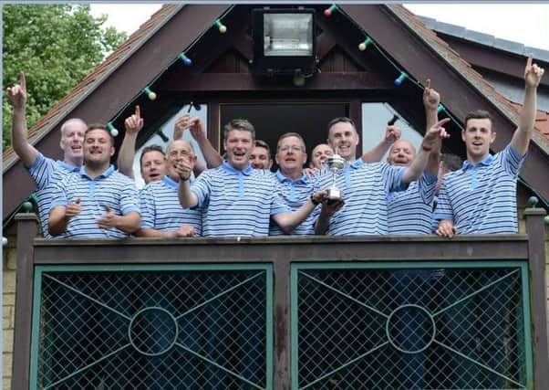 Celebrations for the victorious Kirkcaldy GC team.
