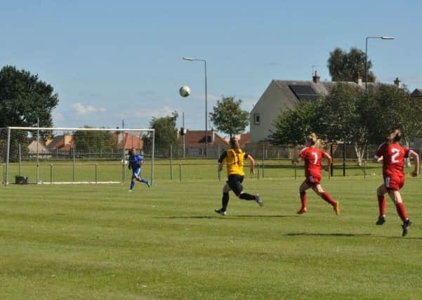 Teri Skivington races clear to lob the keeper in the 7-0 win over Aberdeen for East Fife Ladies