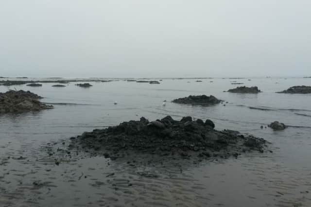 East sands was littered with mounds of silt and debris