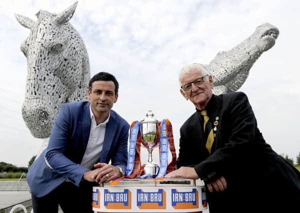 At the draw, in the shadow of teh Kelpies, are Alloa boss Jack Ross, left, and East Fife vice-chairman Dave Marshall (picture by Michael Gillen)