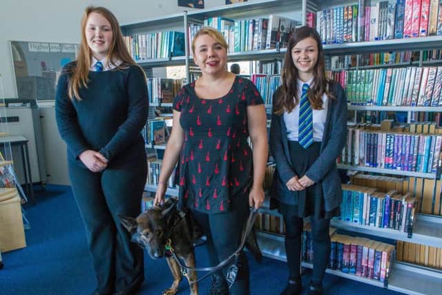 New York Author Kody Keplinger attends Auchmuty High School to visit pupils Miryn Doyle (14) and Chloe Watson (15) after they won a competition to meet her.