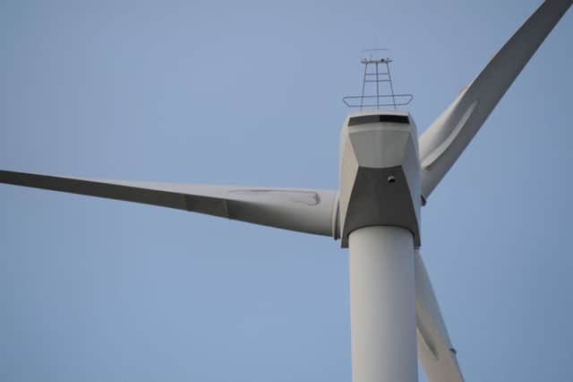 The councillor hit back at the university's comments on the wind farm plans