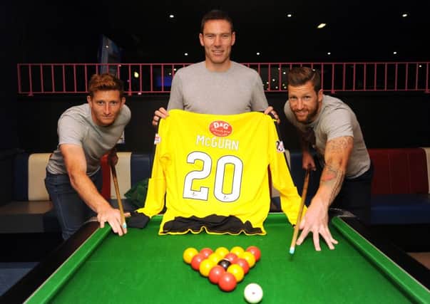 David McGurn (centre) is flanked by former Raith team mates Jason Thomson and Iain Davidson at Styx Pool Hall in Kirkcaldy. Credit - Fife Photo Agency