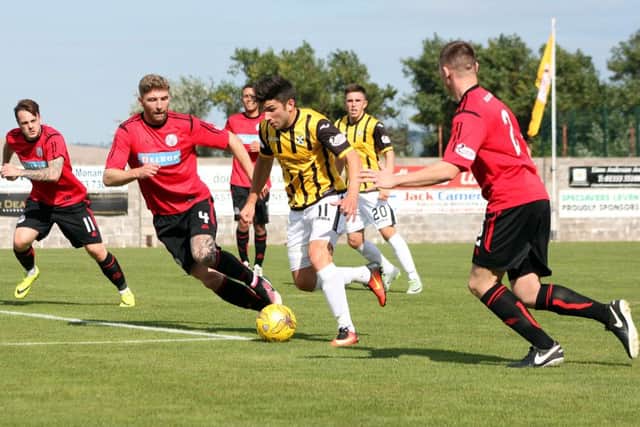 Kyle Wilkie weaves his way through the Brechin backline. Picture by Jim Corstorphine.