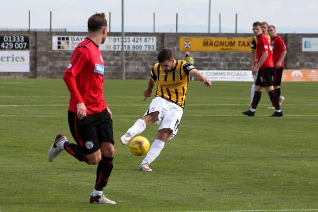 East Fife's Scott Robinson missed from the spot.