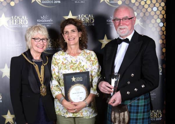 Mandy and Norman collect the award from depute provost Kay Morrison. Picture by Stephen Gunn Photography Copyright