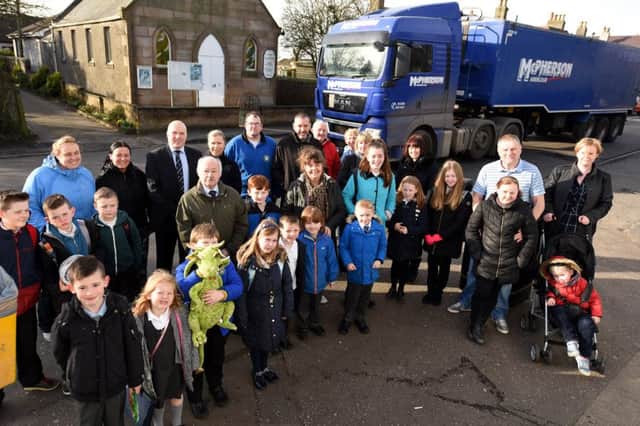 Cllr Ian Sloan pictured earlier this year with village residents Pic: Fife Photo Agency
