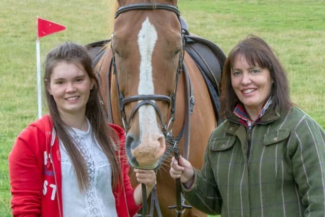 Milly Morrison and Fiona Morrison were delighted to raise Â£3120 from a chairty pick-a-fence event at Kinnair Cross Country for the Scottish Charity Air Ambulance and Burntisland First Aid Trust after Milly was involved in a serious horse accident last July.