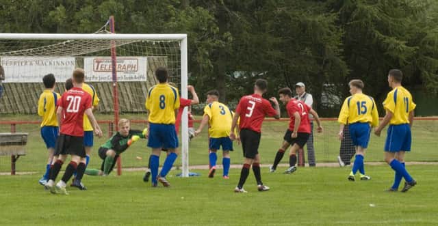 Kieron Conway scores Tayport's third goal and his first for the club.
