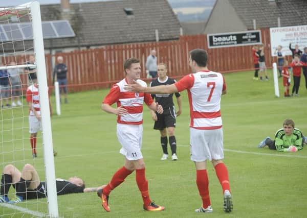 McIntosh scores the third for Bonnyrigg - but it was to get much worse for Burntisland. Pic Greg Macvean