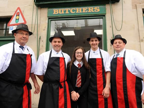 A family affair at Courts the butchers, from left Tom senior, Tom junior, Ellen, Calum and Matthew. Pics by FPA