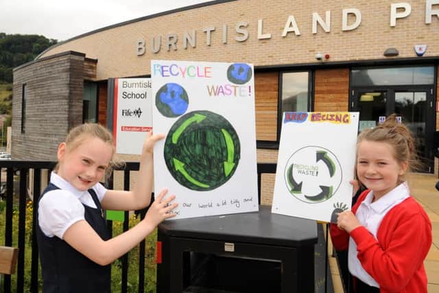 Alice Mair (9) and Mhairi Crawford (8) urge people to recycle their waste
