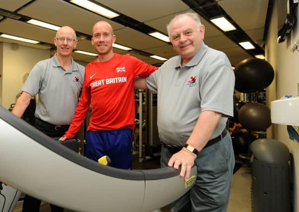Paralympian Derek Rae who has received funding from Kirkcaldy and Central Fife Sports Council towards costs of competing in Rio with chairman Alistair Cameron and secretary Ken White -  credit - FPA  -