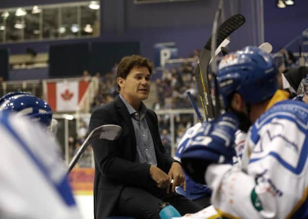 Todd Dutiaume addresses his players on the bench at Braehead. Pic: Steve Gunn