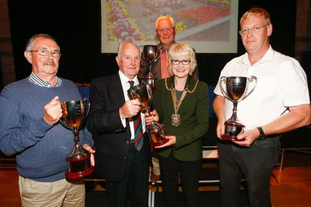 Beautiful Fife Garden winners: (L-R) Alexander Boyek, Jim Thomson, Donald Ellis (back), Depute Provost Kay Morrison and Stuart Welch.