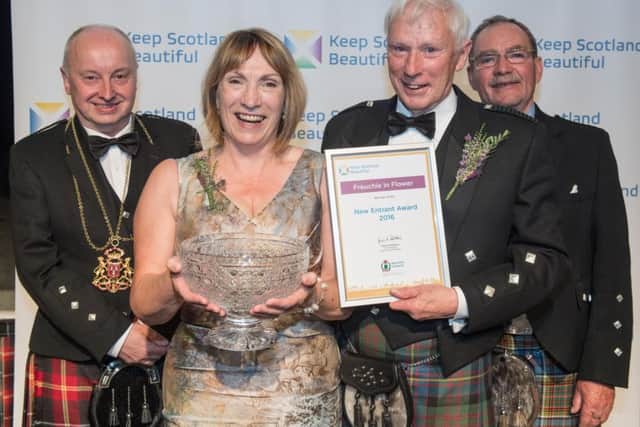 Evelyn Jardine and Ewen Jardine of  Freuchie in Flower celebrate receiving their awards from George Adam, Lord Provost of Aberdeen, and  George Anderson of the Beechgrove Garden