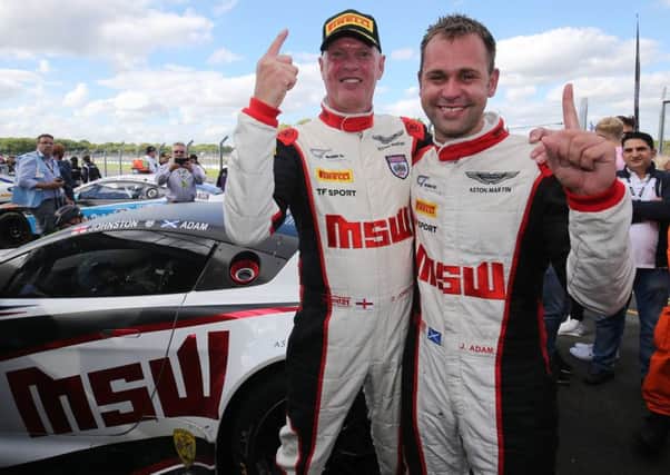 Jonny Adam (right) celebrates winning the 2016 British GT title with team mate Derek Johnston.