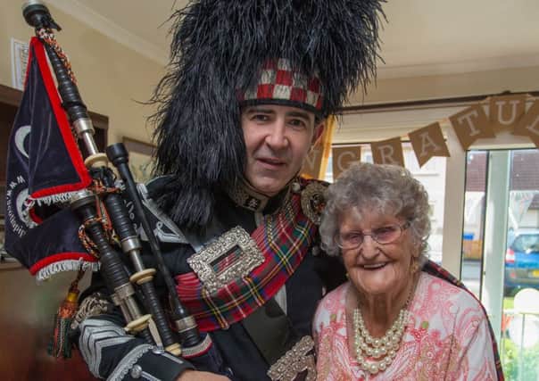 Piper Steven Dewar and Birthday girl Mary Fowler. Pic: Steven Brown