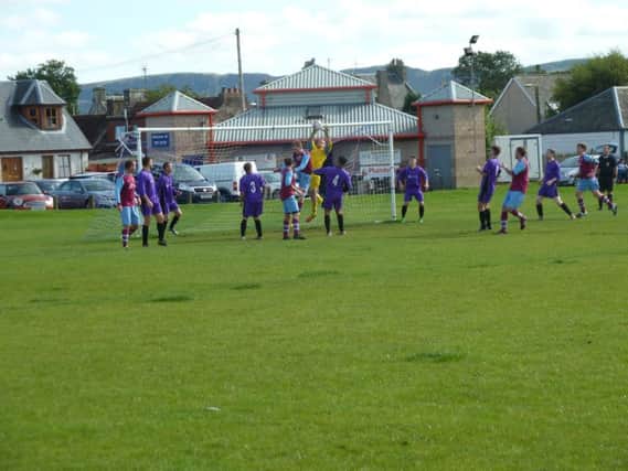 Cupar go on the attack as they try to see off Kinross.