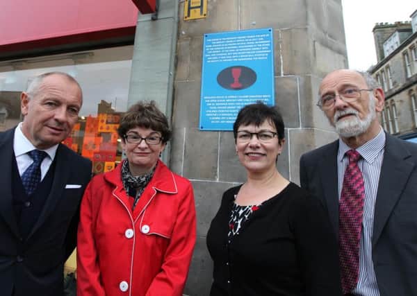 Unveiling of plaque in memory of Pavel Kravar.  From left, H E Libor Secka , Ambassador of the Czech Republic to the Court of St James; Principal Professor Sally Mapstone; Professor Verity Brown, Vice-Principal (Enterprise & Engagement); Mr Paul VysnÃ½, retired lecturer in History who researched the history of Pavel Krava?.