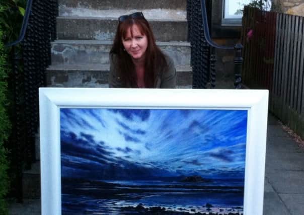 Kirkcaldy artist Catriona MacEachen with a painting auctioned for The Price's Trust for Â£2700