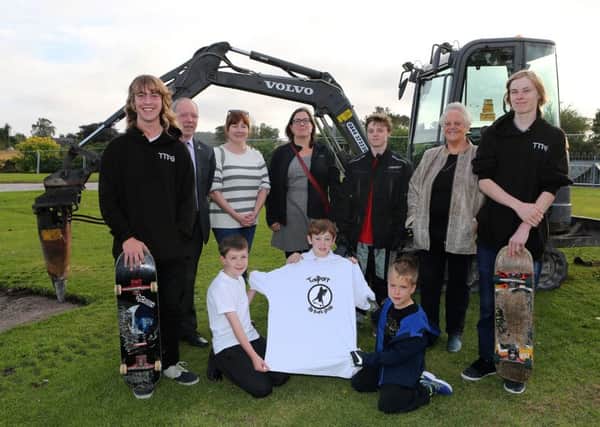 Members of the Tayport Top Park Group, from left, back - Adam Penman, Councillor Bill Connor, Stephanie Forbes, Anna Moss, Ruaridh Morrow, Councillor Maggie Taylor and Kester Sharp. Front - Oliver Forbes, Ben Forbes and Billy Moss. (Pic by Dave Scott)