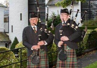 Pipers Bill Grant and Danny Hutchinson from the Buchan Peterson Pipe Band.