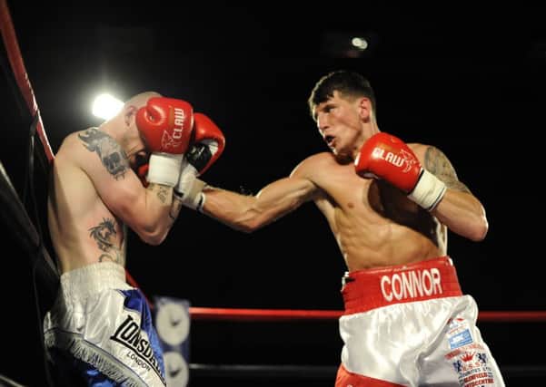 Connor Law on his way to victory over Darryl Sharp in his previous bout. Pic by Alan Murray
