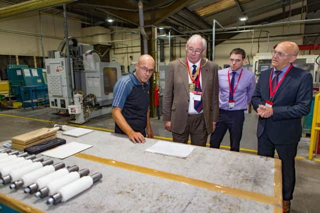 CoorsTek, Glenrothes is being awarded by Fife Council in recognition of 35 years of business in the town and to the local economy. - Pictured: Provost Jim Leishman is shown around on a tour of the manufacturing facilities in Glenrothes by Timothy Coors (Group CEO) and Executive VP Andreas Schneider, talking to staff members along the way. - Monday 24 October 2016