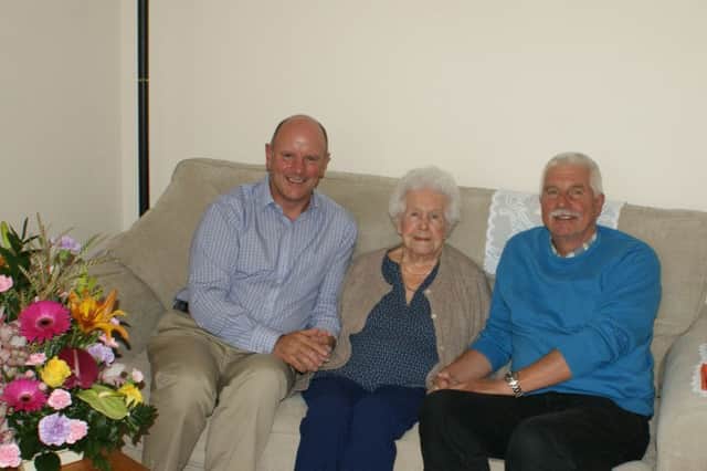 Violet Langham celebrates 100th birthday with Alan McIlravie, Provost of Kinghorn and Bob Crewes, chairman of the community centre