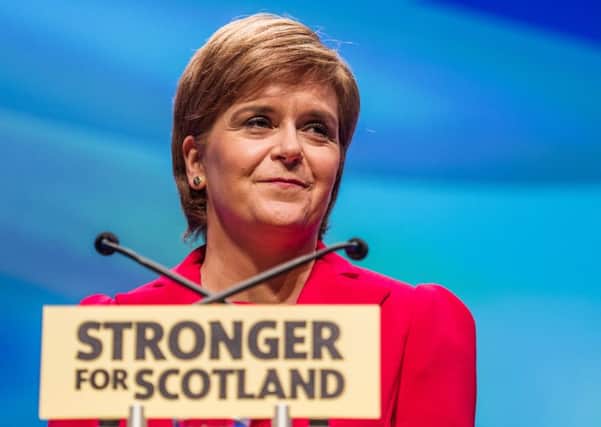 The First Minister has welcomed the new Living Wage rate of Â£8.45 an hour. Pic: John Devlin.