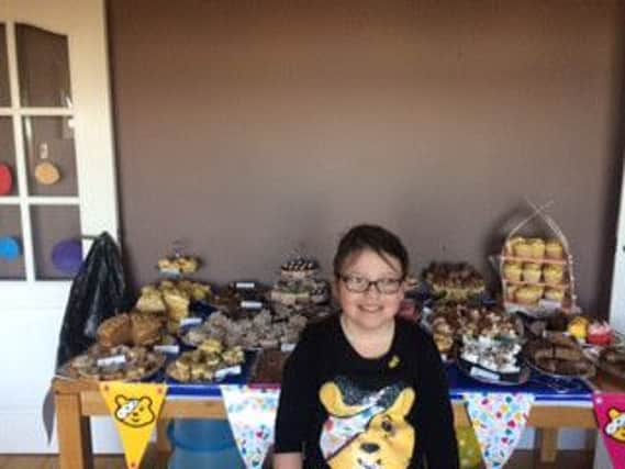 Jessica with her bake sale goodies