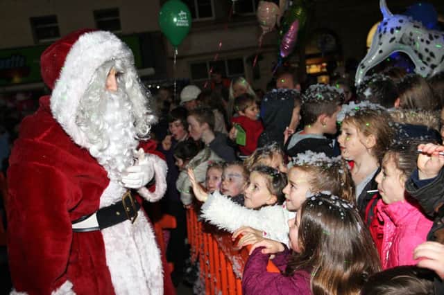 Santa is given a warm welcome by youngsters in Cupar