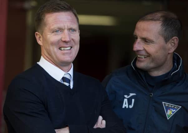 Raith manager Gary Locke and Dunfermline boss Allan Johnston pictured together before kick off on Saturday.  Picture Ian Rutherford