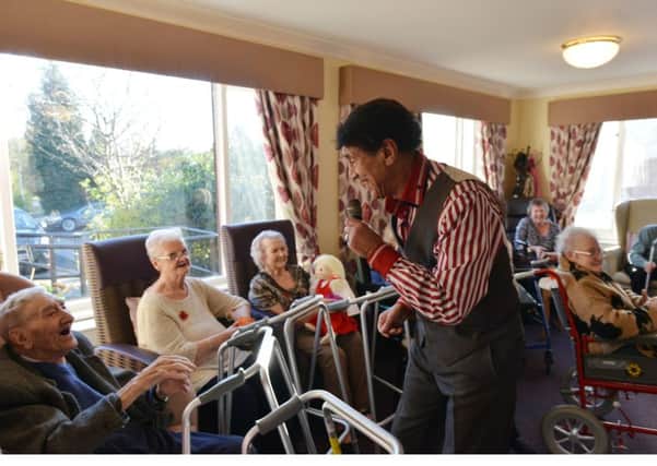 Christian entertains the residents at Balfarg care home in Glenrothes (picture by George McLuskie)