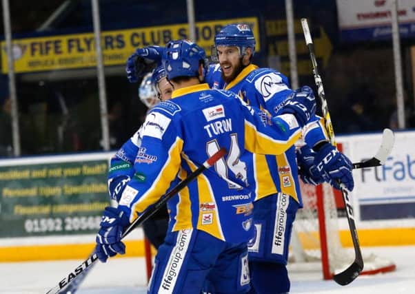 Phil Paquet celebrates his rare double short-handed goal against Coventry Blaze on Saturday. Pic: Steve Gunn