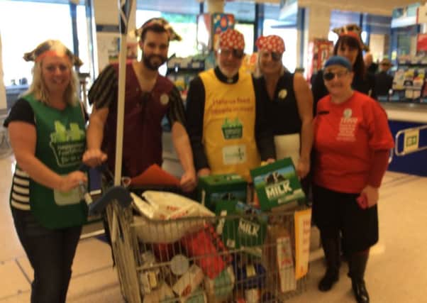Canon Pat pictured with volunteers at Tesco, Cupar, which is one of the collection points