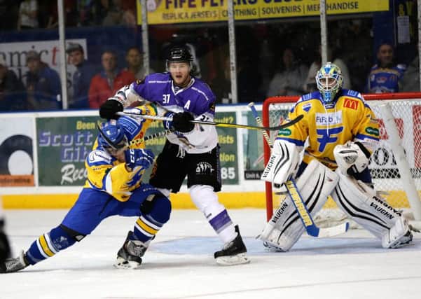 Jay Rosehill (Braehead Clan) checks James Isaacs (Fife Flyers) in one of several flashpoints the last time the sides met in Kirkcaldy. Pic: Steve Gunn