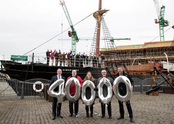 All supporters on deck as Historic RRS Discovery surpasses crowd funding goal & Pictured from left with the balloons to celebrate reaching the Â£40,000 target are Andy Lothian Chairman of Dundee Heritage Trust, Mark Munsie Operations Director, Gill Poulter Curator, John Watson Project Manager and Paul Jennings Executive Director. Picture by Graeme Hart/Perthshire Picture Agency .