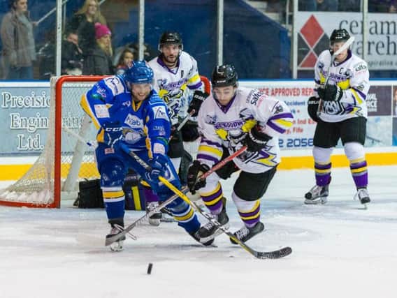 Fife Flyers' Jamie Wilson battles for the puck in last night's defeat to Manchester Storm. Pic: Martin Watterston