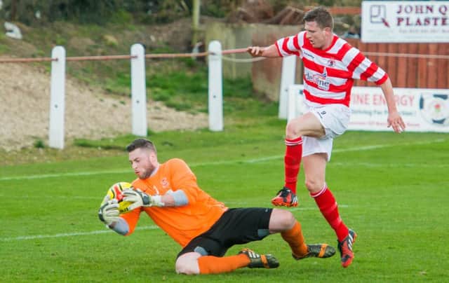 Tayport 'keeper Gavin Sorely was a busy man during the opening exchanges.