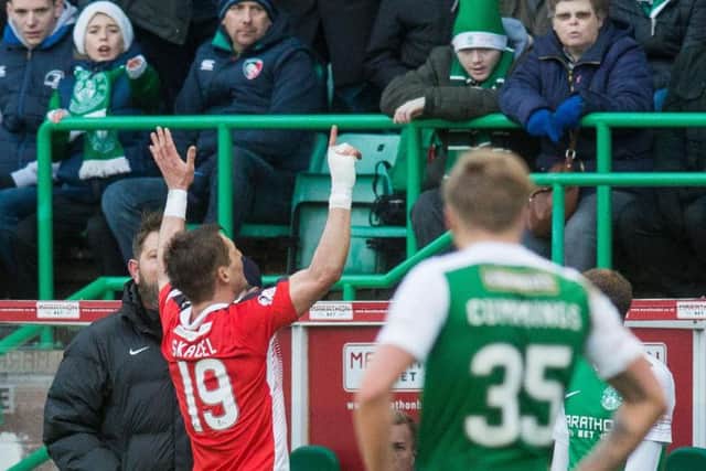 Rudi Skacel gestures to the Hibs fans as he is substituted. Pic: Ian Georgeson