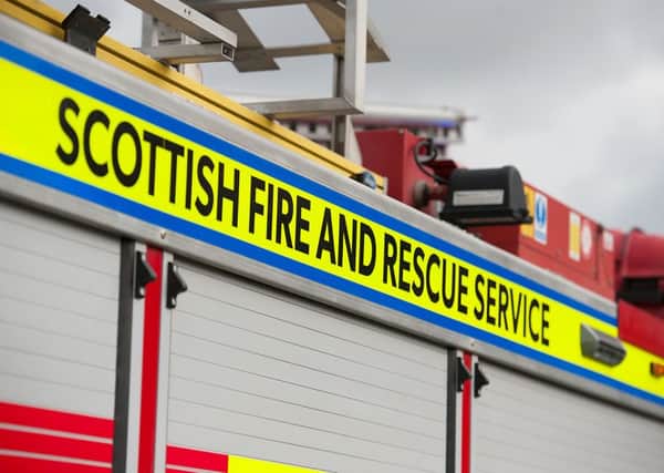The A92 was closed after a car fire.