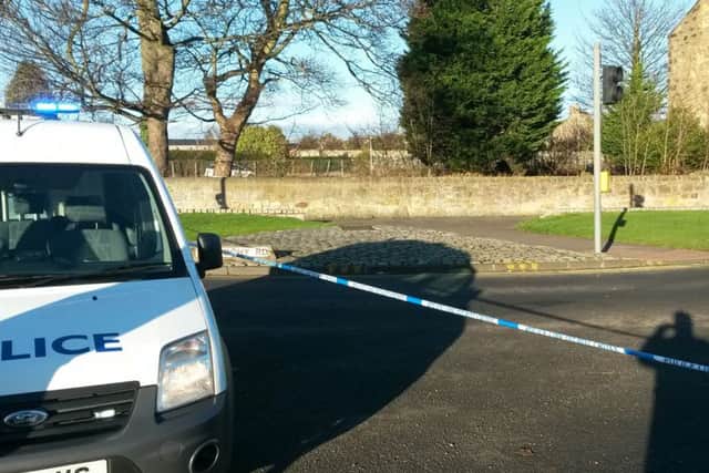 Victoria Road, Kirkcaldy - cordoned off after man found dead, another in hospital (Photo: FFP)