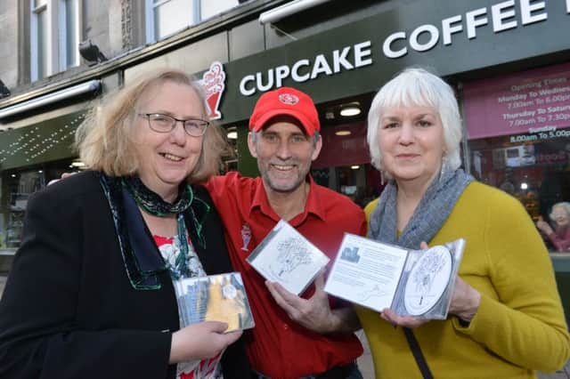 Maureen (left) and Sheena with Mike Lowe from the coffee shop