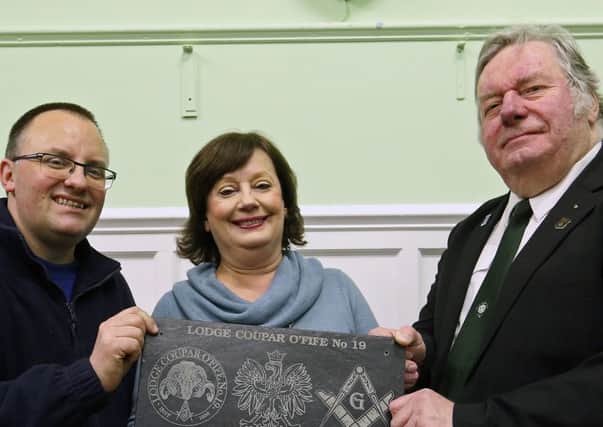 From left, with a plaque recording the Polish forces' billeting at the Cupar Lodge - Cupar historian Steve Penrice, Violeta Ilendo, who chairs Fife Polish Education Trust and Douglas Abercrombie, Master of Lodge Coupar O' Fife No 19.