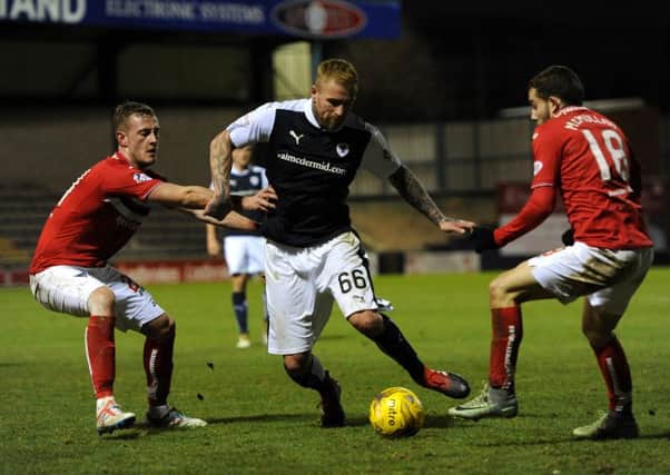 New signing Ryan Stevenson tries to find a way through the Dunfermline defence -   credit- Fife Photo Agency