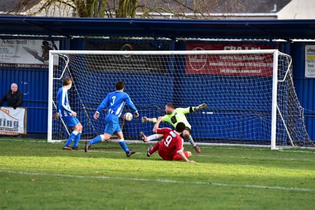 John Martin equlaise for Glenrothes, but its Penicuik who go through to the next round