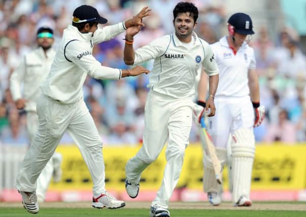 India's two-time World Cup winner Shanthakumaran Sreesanth (centre) has held signing talks with Glenrothes Cricket Club. Pic: Anthony Devlin/PA Wire.